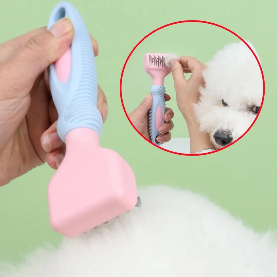 Pink pet grooming comb with stainless steel knot knife, massage brush head, and comb teeth on a white background.