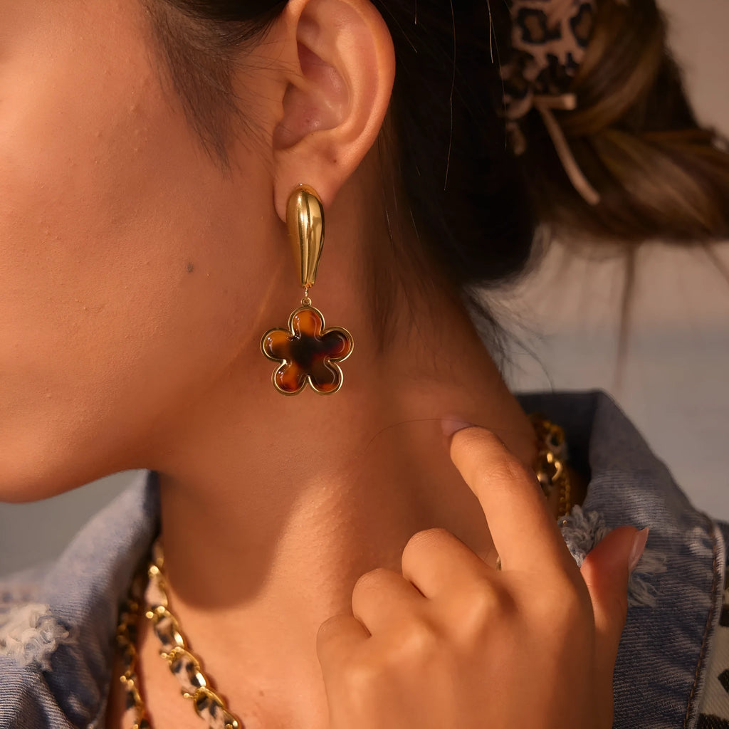 Women's tortoiseshell resin finish earrings with heart or flower designs in 18K gold electroplated stainless steel