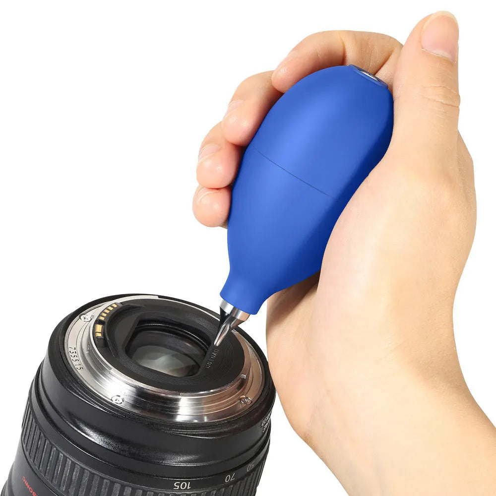 Blue rubber handheld dust removal ball air blower for cleaning cameras and mobile phones.