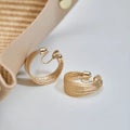 Geometric multi-layer bracelet earrings set with silver and gold colour pairs on copper
