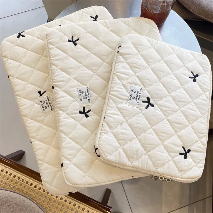 Laptop sleeve bag with rhombus embroidered bow in light blue colour