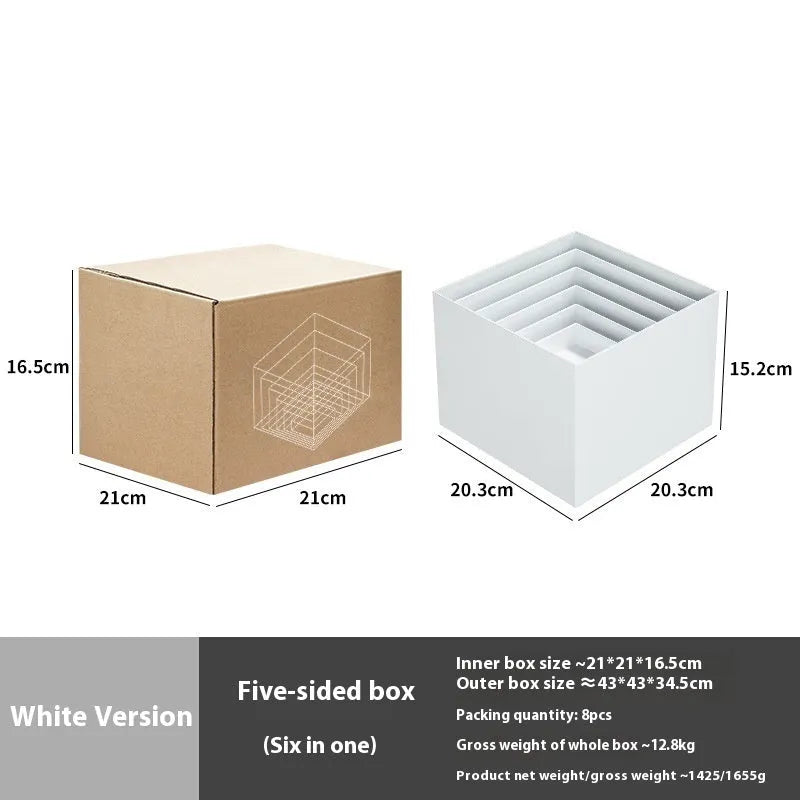 Set of six white geometric plastic cubes arranged as a tiered dessert display stand.