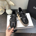 Women's beige distressed leather vintage lace-up sneakers with round toe and rubber sole on a white background.