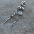 Geometric antique silver earrings with long rhinestone pendants and XINGX design