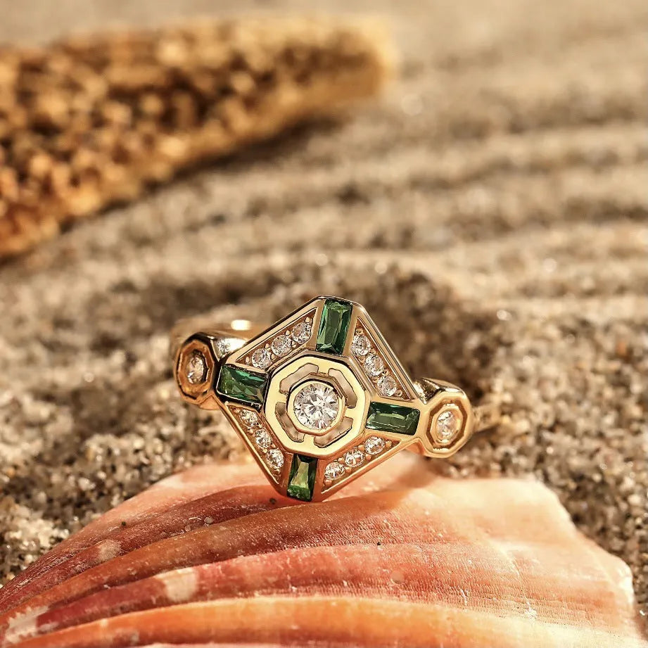 Square geometric ins style women's ring in lvzuan colour on a plain background.