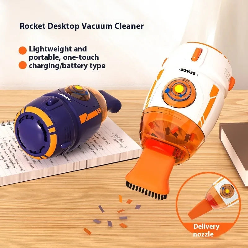 USB handheld desktop vacuum cleaner in blue rocket design on a wooden desk