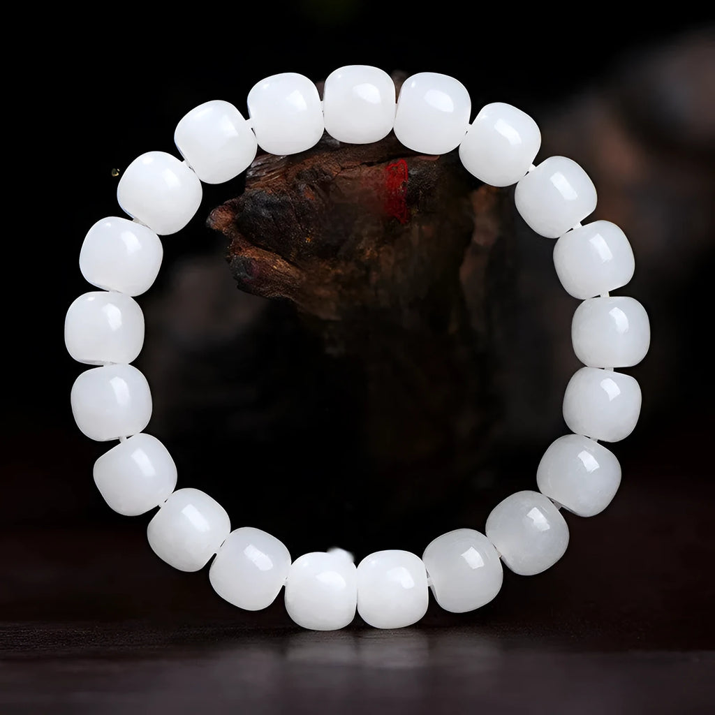 White Hetian jade barrel bead bracelet showing three size options: 5x6mm, 7x8mm, and 8x10mm beads.