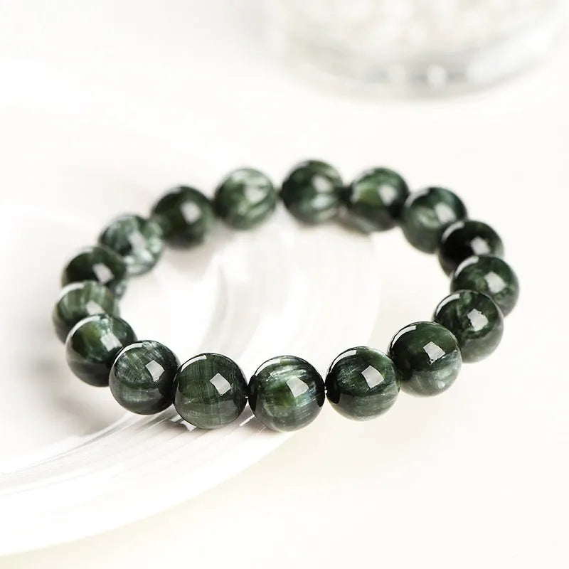 Green Dragon Crystal bracelet with 8-9mm round beads featuring Ruyi geometric design
