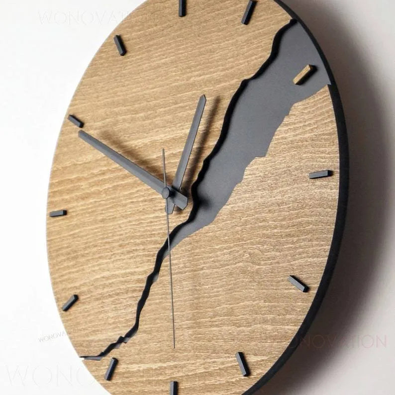 Modern wooden wall clock with creative crack pattern design on white wall