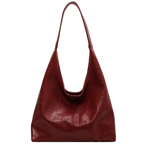 Casual soft PU leather large capacity shoulder bag in street trend style.