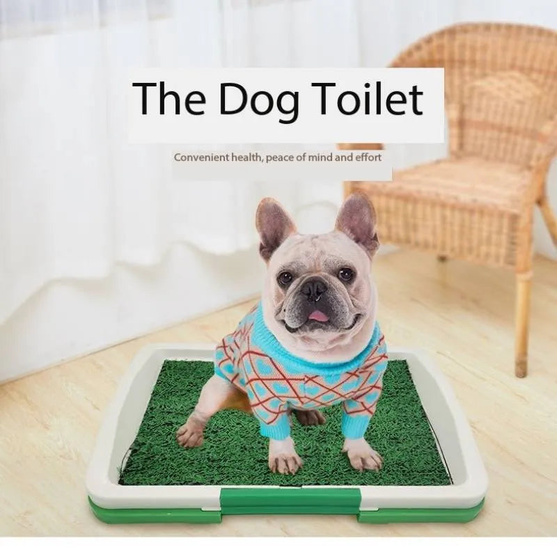 Green artificial turf dog toilet tray with three-layer construction for indoor puppy training.