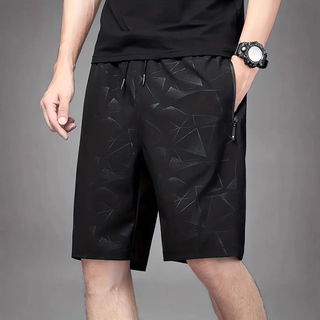 Men's loose-fit casual sports shorts in polyester, shown in black, blue, and grey colour options.