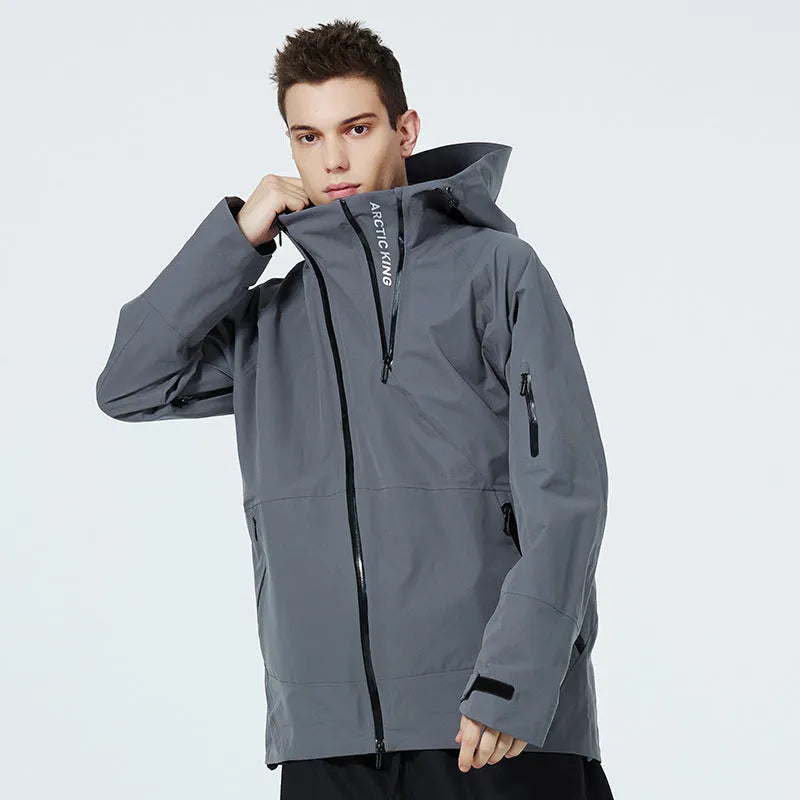 Men's and women's thin ski suit in black, designed for windproof and waterproof winter sports protection.
