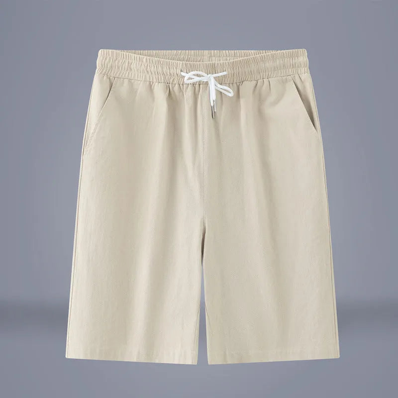 Cotton-linen blend cropped pants in a solid colour with a drawstring waist, shown in a mid-length cut.