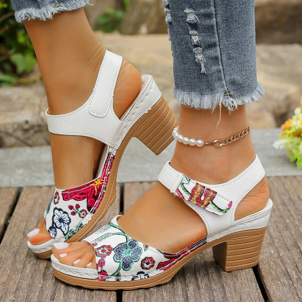 White women's high heel sandals with velcro buckle strap and rubber sole
