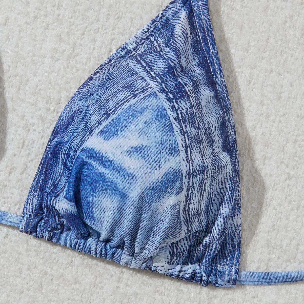 Women's denim blue printed bikini with adjustable straps, shown front view