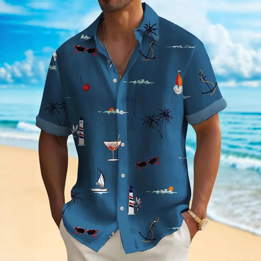 Man wearing a loose fit short sleeve shirt with a colourful digital Hawaiian print pattern.