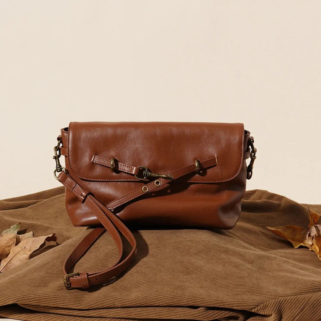 Genuine leather crossbody bag in Sugar Brown with sewing thread detail and clamshell opening