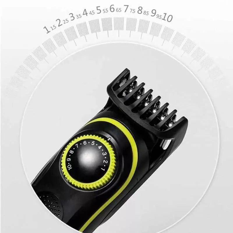 Black KM-696 rechargeable electric hair clipper set with stainless steel blades and accessories on a white background.