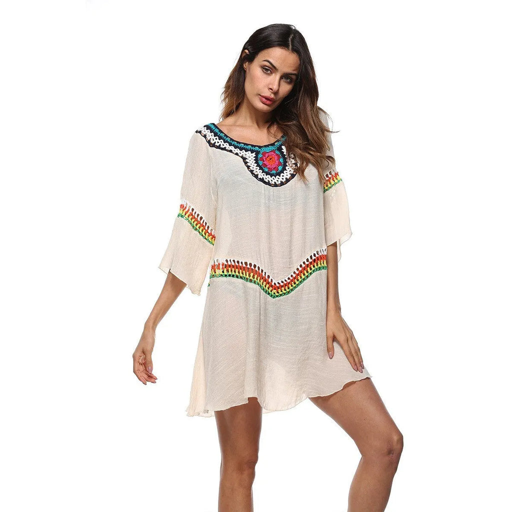 Crocheted ethnic style women's sun protection clothing in apricot colour for beach wear.