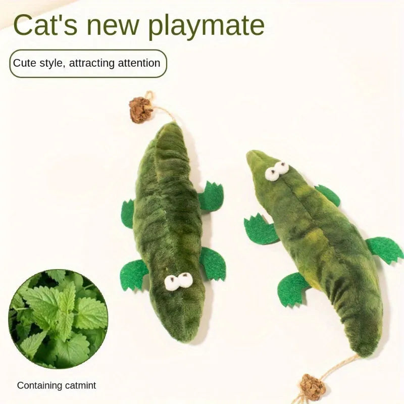 Green plush alligator cat toy with catnip filling and peppermint scent for oral cleansing