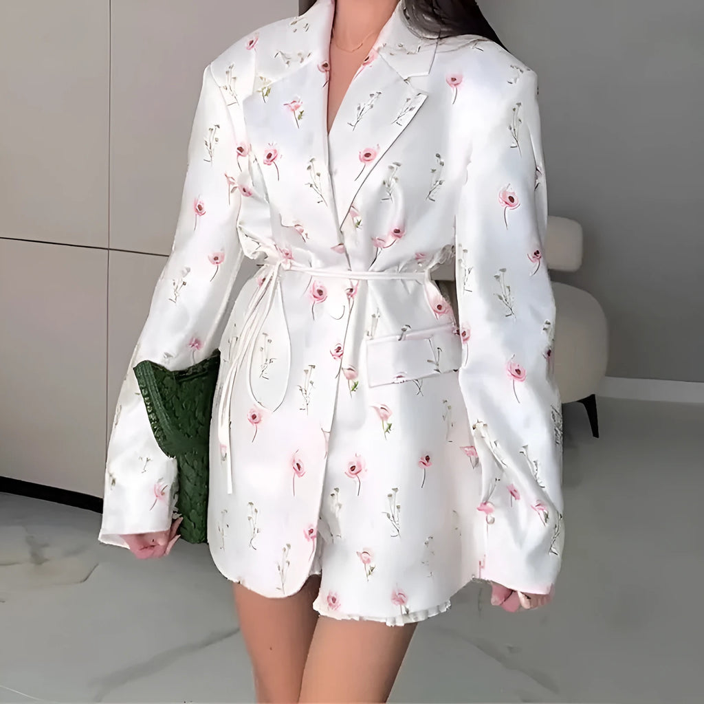 Women's white suit jacket with lace-up waist detail and regular long sleeves