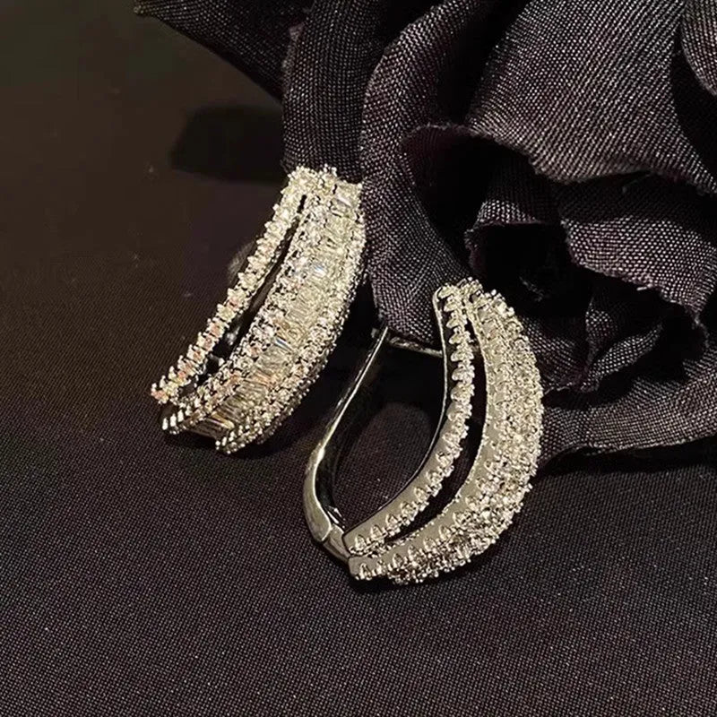 Geometric copper stud earrings with zircon inlaid design in white gold colour finish