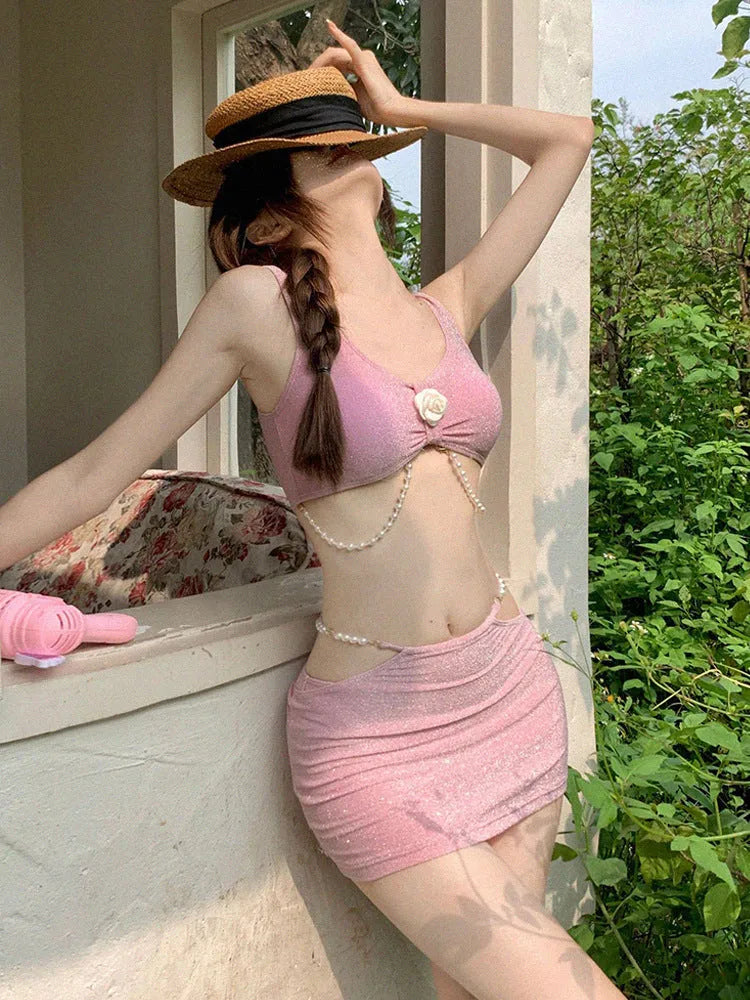 Black or pink bear vacation themed three-piece bikini swimsuit set for swimming.