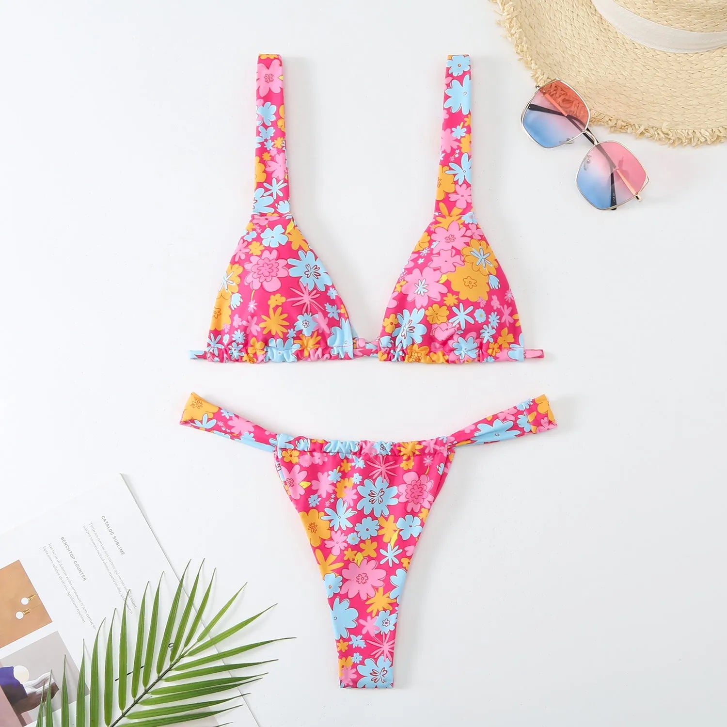 Women's floral print bikini swimsuit in briefs style with multi-colour patterns and polyester fabric construction
