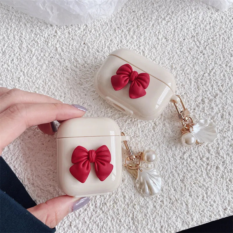 Beige red tpu protective case for AirPods Pro with a bow design on the shell.