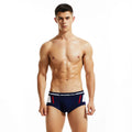 Men's cotton low waist boxers in red, dark blue, and light grey showing hip lift design