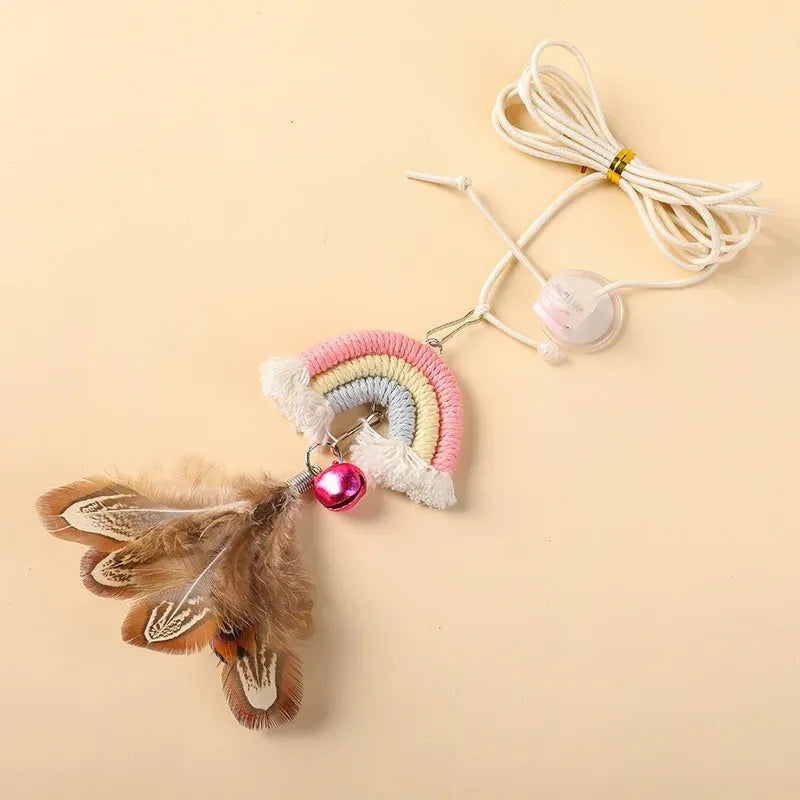 Colourful feather cat rope toy hanging from a door with elastic swing and sticky buckle clamp