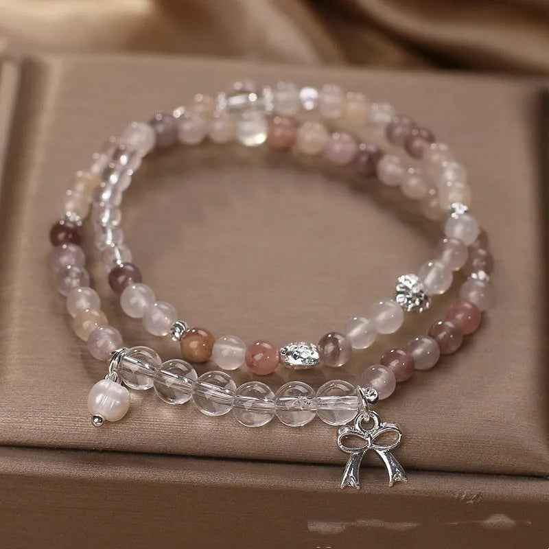 Chinese ancient style beaded butterfly bracelet on woman's wrist