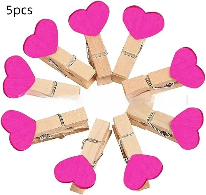Set of five handmade solid wood heart-shaped clips in red, white, yellow, pink, and rose red.