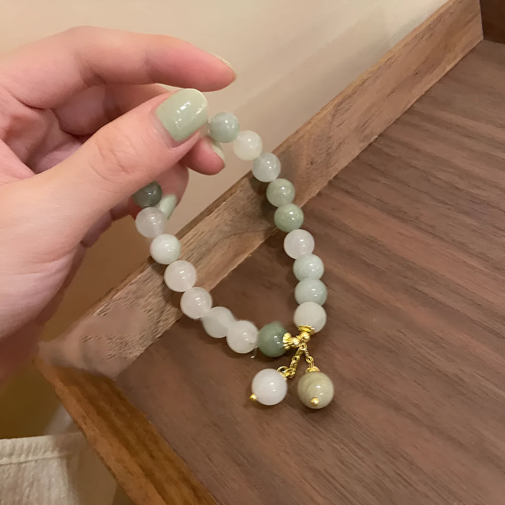 Handmade multi-layer beaded bracelet with small rice-shaped beads in white round bead style for women