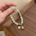 Handmade multi-layer beaded bracelet with small rice-shaped beads in white round bead style for women