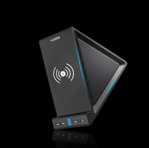 Black multifunctional Bluetooth speaker unit with integrated wireless charging pad and phone stand.