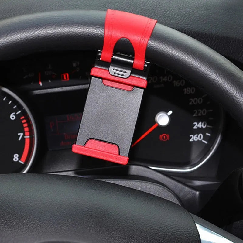 Black steering wheel clip mount holding smartphone on car steering wheel