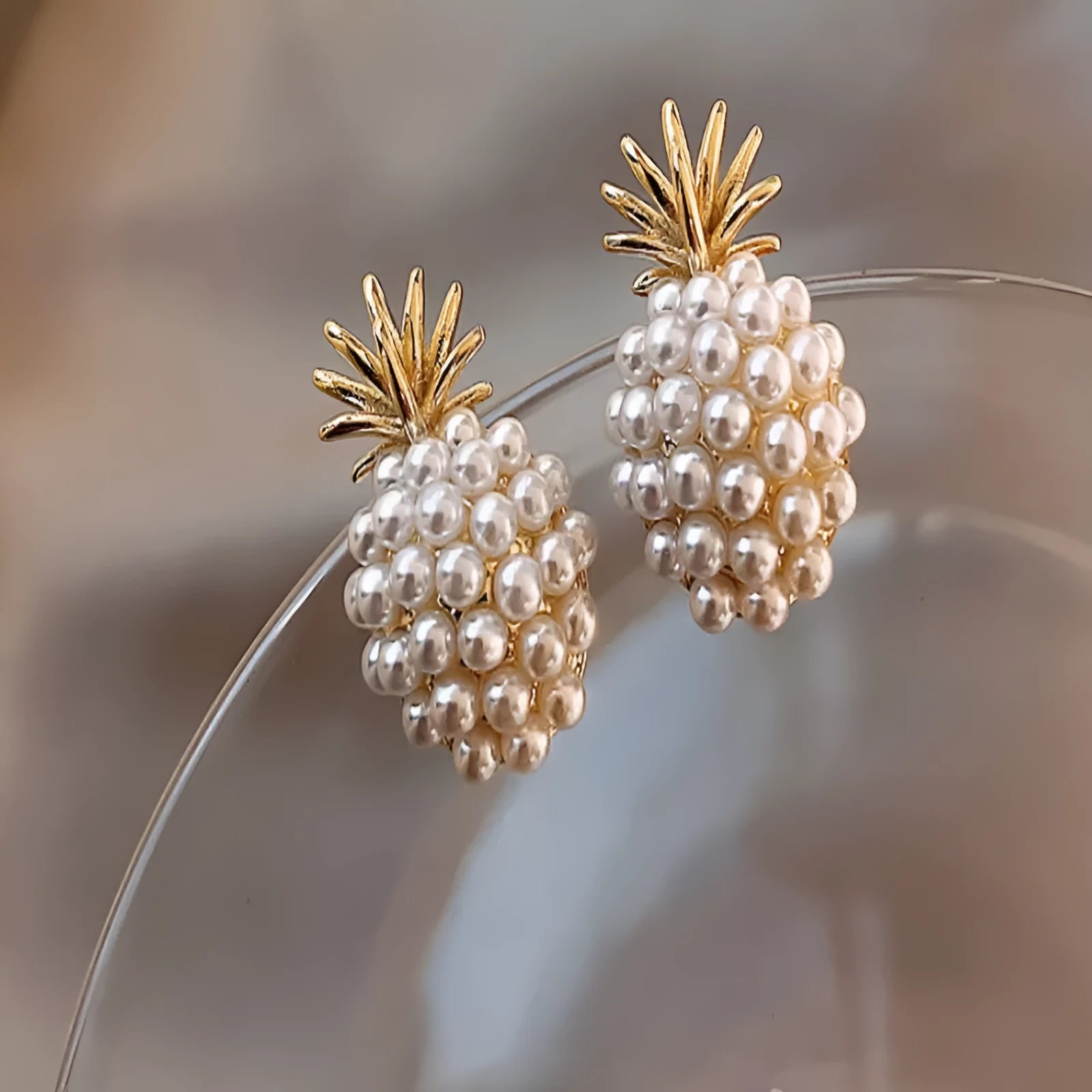 Korean style pineapple starfish pearl earrings with artificial gem inlays in gold, silver colours