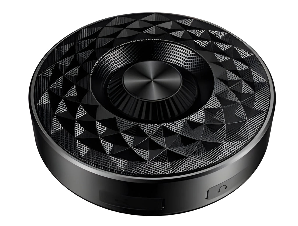 Mini circular Bluetooth speaker in black, orange and silvery white colours showing compact design