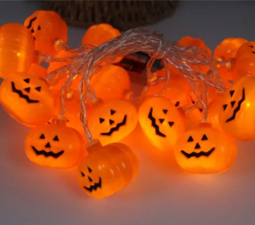 Halloween LED string lights with pumpkin, bat and ghost pendants on 1.2 metre white cable