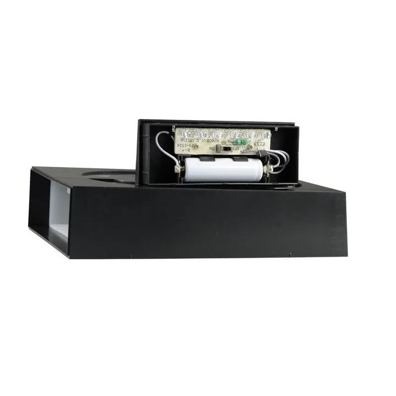 Solar powered white LED house number light mounted on a wall with IP65 waterproof rating