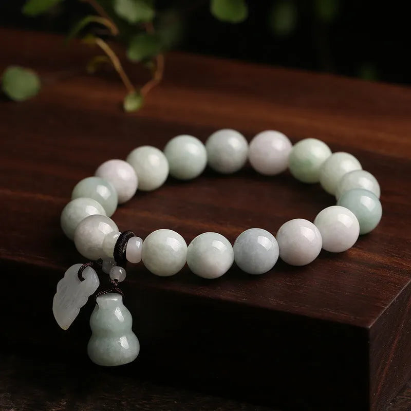 Natural jade bracelet with geometric hanging design and Buddhist elements including Maitreya Buddha motif