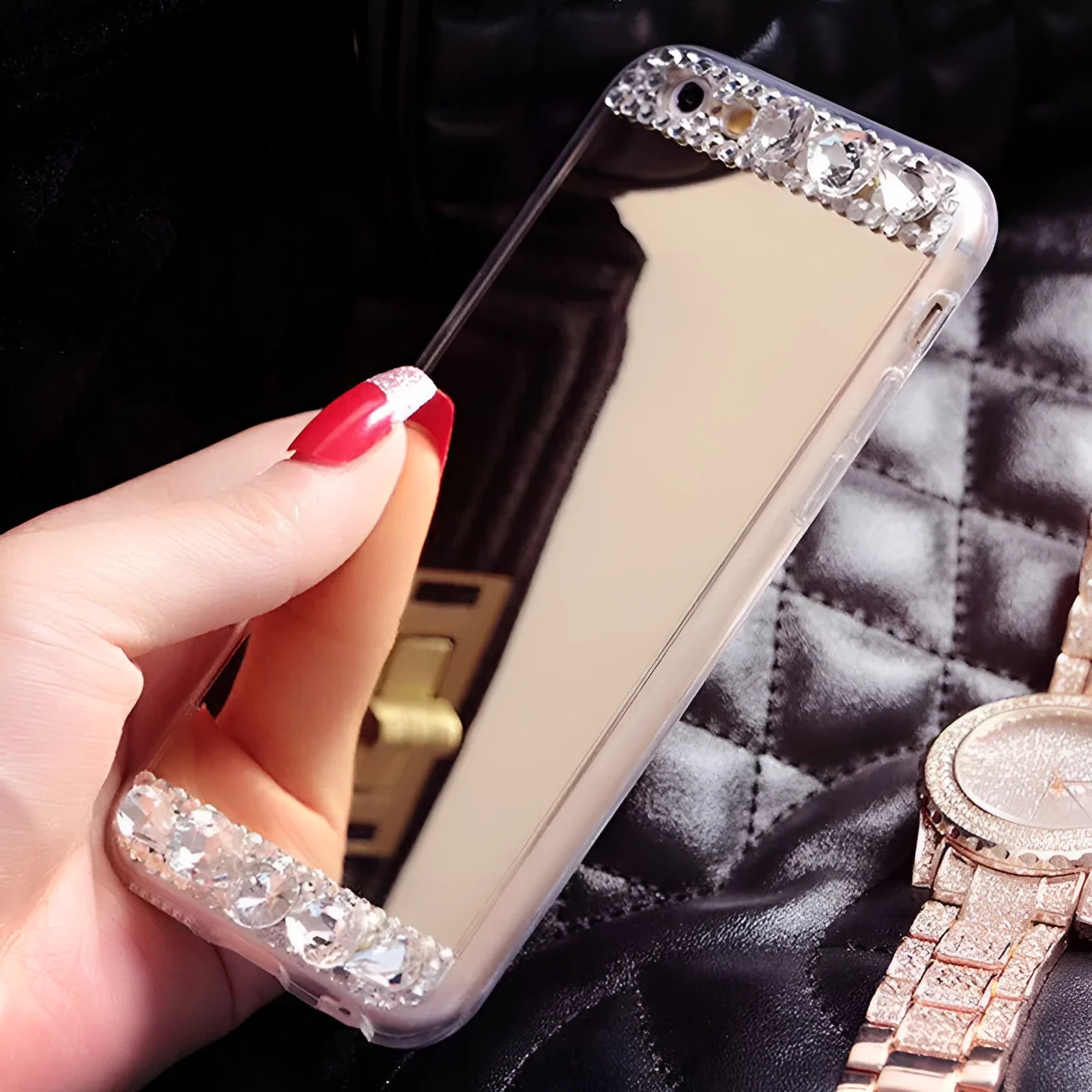 Gold rhinestone silicone back case on a Huawei smartphone.