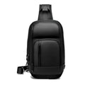 Black PVC outdoor shoulder bag showing internal organisation compartments and air cushion strap