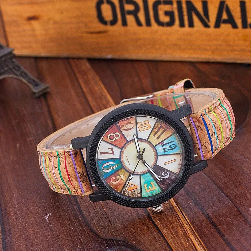 Women's vintage-style quartz watch with brown leather strap and 37mm round dial