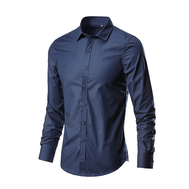 Man wearing a loose fit long-sleeve linen shirt in a neutral colour, showcasing the casual silhouette.