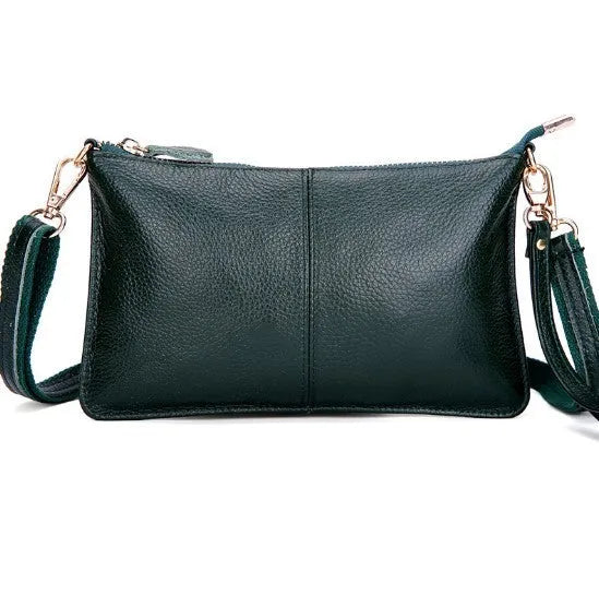 Lady cowhide slant bag in apricot showing top layer leather texture and dual straps