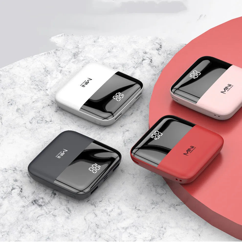 Portable 10000mAh power bank with digital display and dual USB outputs