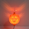 Plastic pumpkin lamp with USB charging cable in yellow or purple light colour
